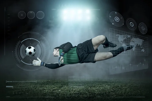 Voetbalspeler met bal in actie — Stockfoto