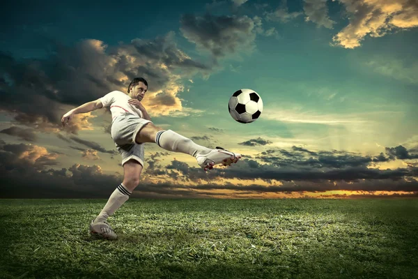 Soccer player with ball in action — Stock Photo, Image