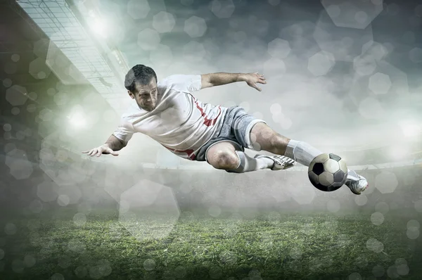 Soccer player with ball in action — Stock Photo, Image