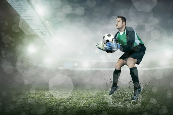 Jogador de futebol com bola — Fotografia de Stock