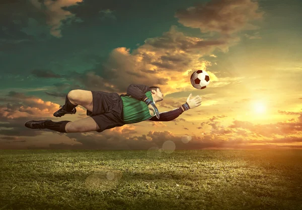 Soccer player with ball in action — Stock Photo, Image