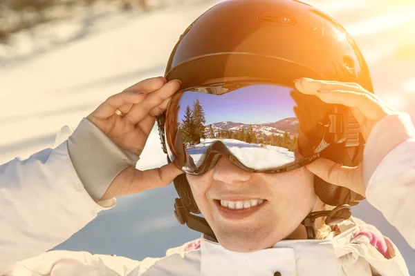 Woman wearing a helmet and glasses — Stock Photo, Image
