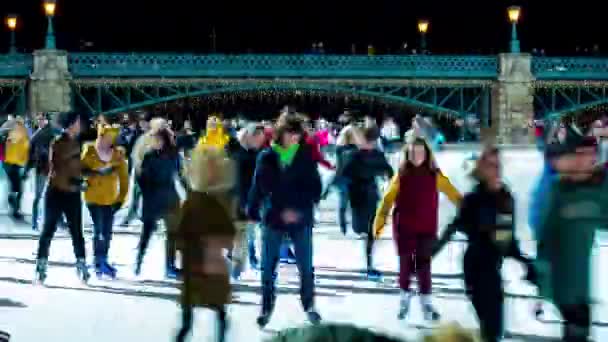 BUDAPEST, HUNGARY - NOVEMBER 30, 2019: Time-lapse view on the people are ice skating in The City Park Ice Rink in Budapest, Hungary. — Stock Video