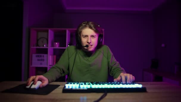 Joyful Young Gamer Rejoices Winning Video Game Smile His Face — Stock Video