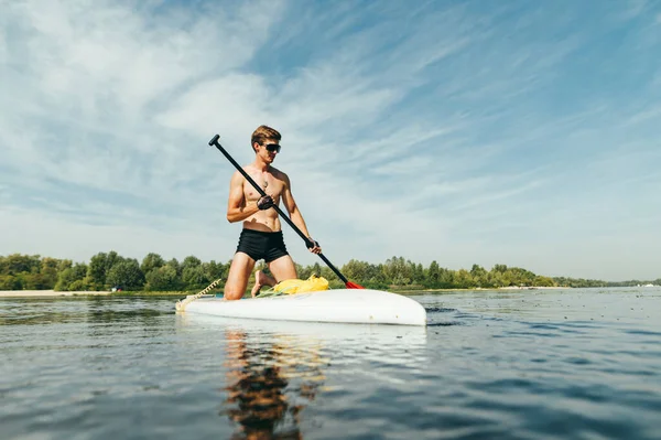 Handsome Man Naked Torso Surfs Sup Board Pond Paddles Looks — Stock Photo, Image