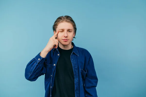 Handsome Young Man Shirt Standing Blue Background Looking Camera Shows — Foto Stock