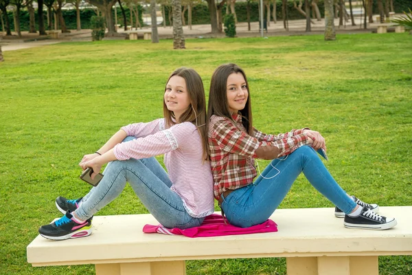 Two girls on walk in park — Stock Photo, Image
