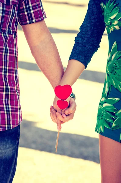 Hearts in hands — Stock Photo, Image