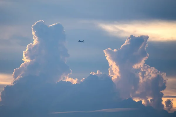 Clouds in the evening sky and planes