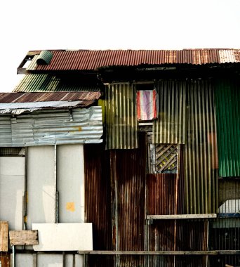 Old house made of Galvanized sheet with Thai flag