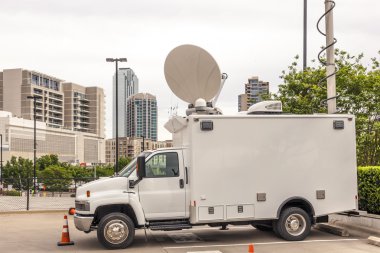 Broadcast vehicle with antennas  clipart