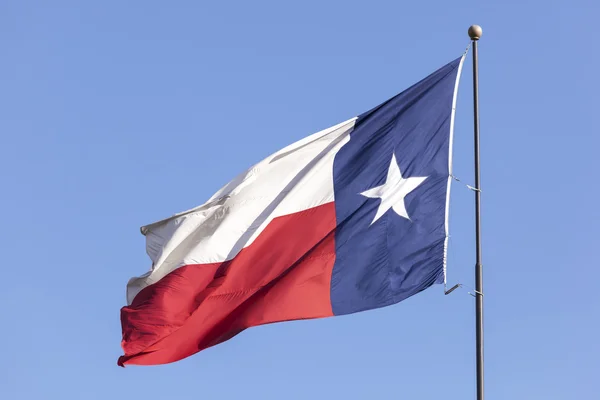 Flag of Texas against blue sky — Stock Photo, Image
