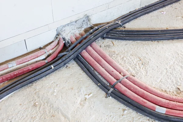 Cables and pipes in a new house — Stock Photo, Image