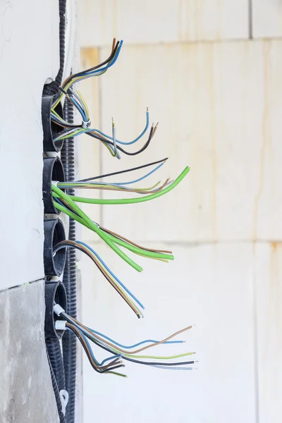 Cables and pipes in the wall — Stock Photo, Image