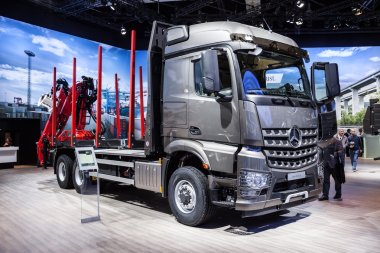 Mercedes Benz Arocs 2651 LK logging truck at the 65th IAA Commercial Vehicles 2014 in Hannover, Germany clipart