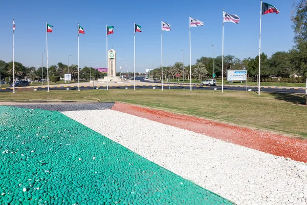 KUWAIT - DECEMBER 12: Flags of Kuwait outside of the Kuwait International Airport. December 12, 2014 in Kuwait City, Middle East — Stock Photo, Image