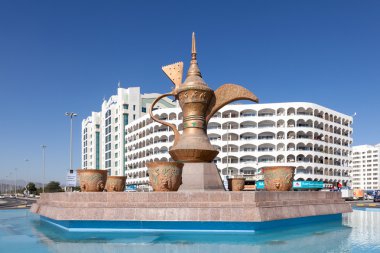 FUJAIRAH, UAE - DEC 14: Coffeepot monument in Fujairah. December 14, 2014 in Fujairah, United Arab Emirates clipart