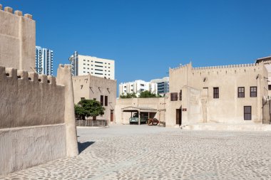 AJMAN, UAE - DEC 17: Historic fort at the Museum of Ajman. December 17, 2014 in Ajman, United Arab Emirates clipart