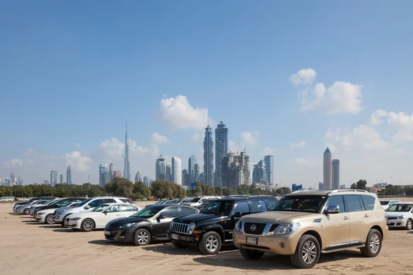 DUBAI, UAE - DEC 18: Cars on a parking lot in the city of Dubai. December 18, 2014 in Dubai, United Arab Emirates — Stock Photo, Image