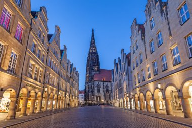 MUNSTER, GERMANY- APR 4: Historic buildings in the old town of Muenster. April 4, 2015 in Muenster, North Rhine Westphalia, Germany clipart