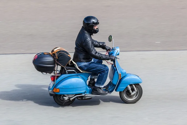 Blue Vespa scooter on the road — Stock Photo, Image