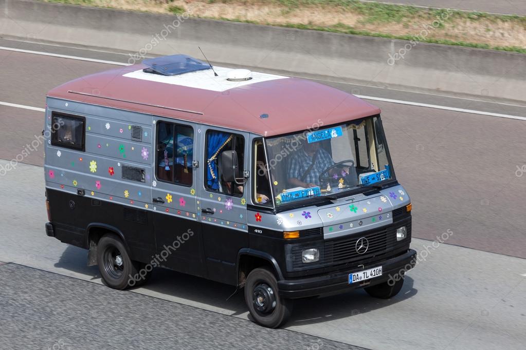 Old Mercedes Benz Camper Van on the highway Stock Editorial Photo