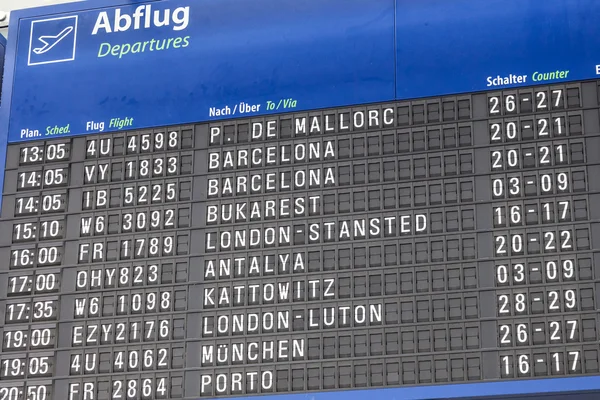 Departures board at the Dortmund Airport, Germany — Stock Photo, Image