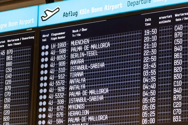 Departure board at the Cologne Bonn Airport, Germany — Stock Photo, Image