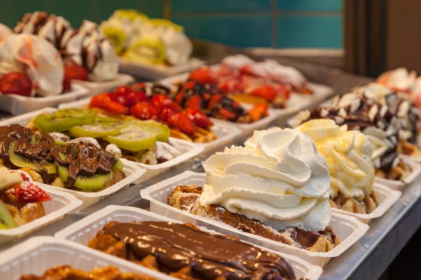 Belgian waffles with several toppings — 스톡 사진