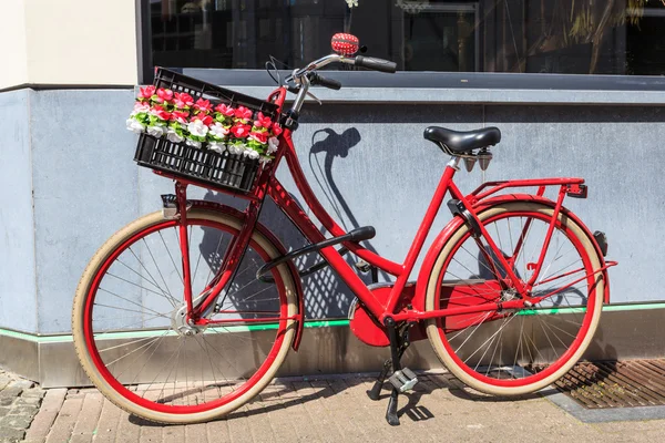 Red bicycle in Belgium — Stok fotoğraf