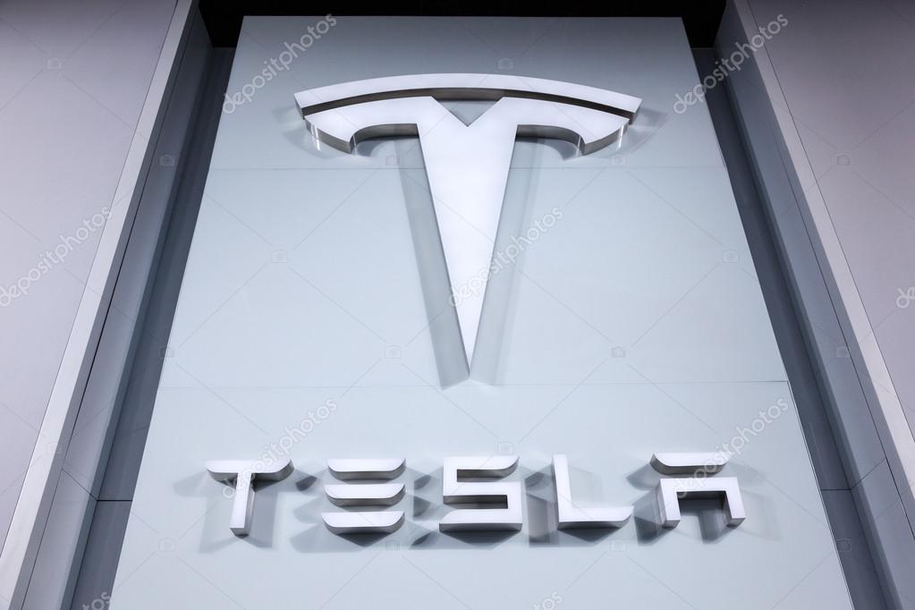 FRANKFURT, GERMANY - SEP 22: Tesla Company Logo at the IAA International Motor Show 2015. September 22, 2015 in Frankfurt Main, Germany