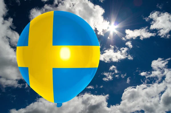 Balloon with flag of sweden on sky — Stock Photo, Image