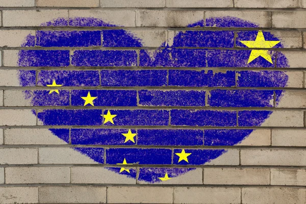 Heart shape flag of alaska on brick wall — Stock Photo, Image