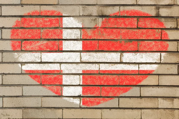 Bandera de la forma del corazón de denmark en la pared de ladrillo — Foto de Stock