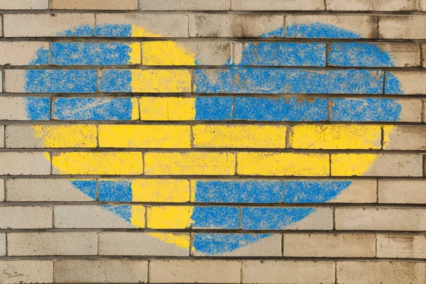 Heart shape flag of Sweden on brick wall — Stock Photo, Image