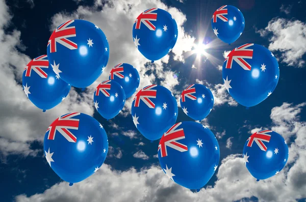 De nombreux ballons avec drapeau australien sur le ciel — Photo