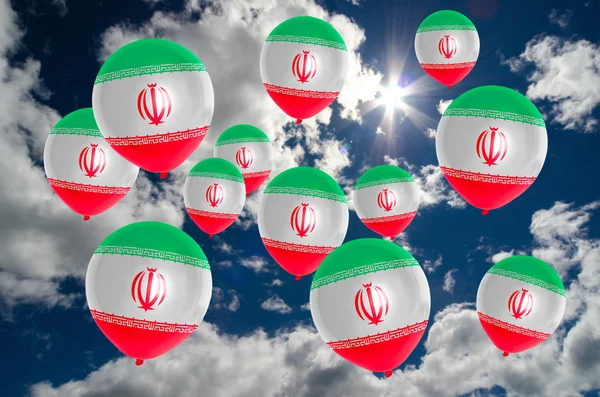 Many balloons with iran flag on sky — Stock Photo, Image