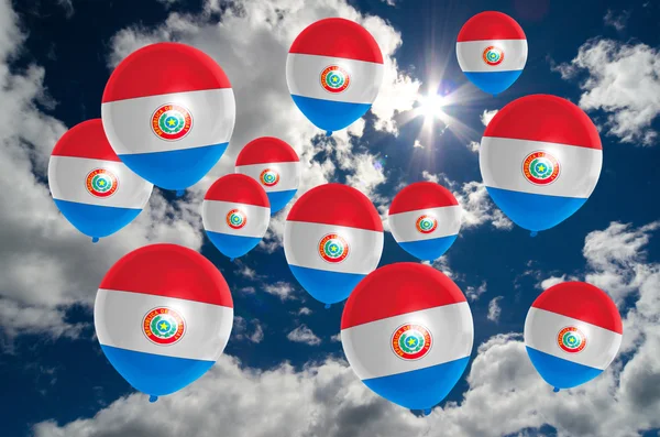 Muchos globos con bandera de paraguay en el cielo —  Fotos de Stock