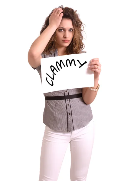 Mujer incómoda sosteniendo papel con texto Clammy —  Fotos de Stock