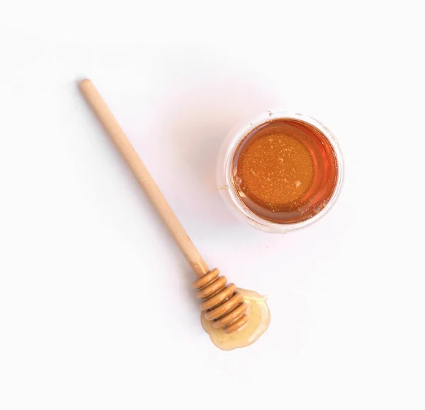 Honig Mit Hölzernem Löffelstiel Isoliert Auf Weißem Hintergrund Süßes Essen — Stockfoto