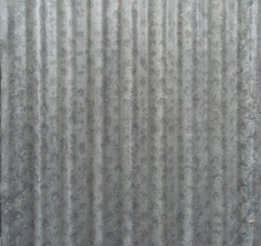 Metal çelik şeritler. Paslı demir metal, çinko çelik duvar, desenli arka plan. Tasarım dekorasyonu için dış mimari materyalinin yakın plan görüntüsü.