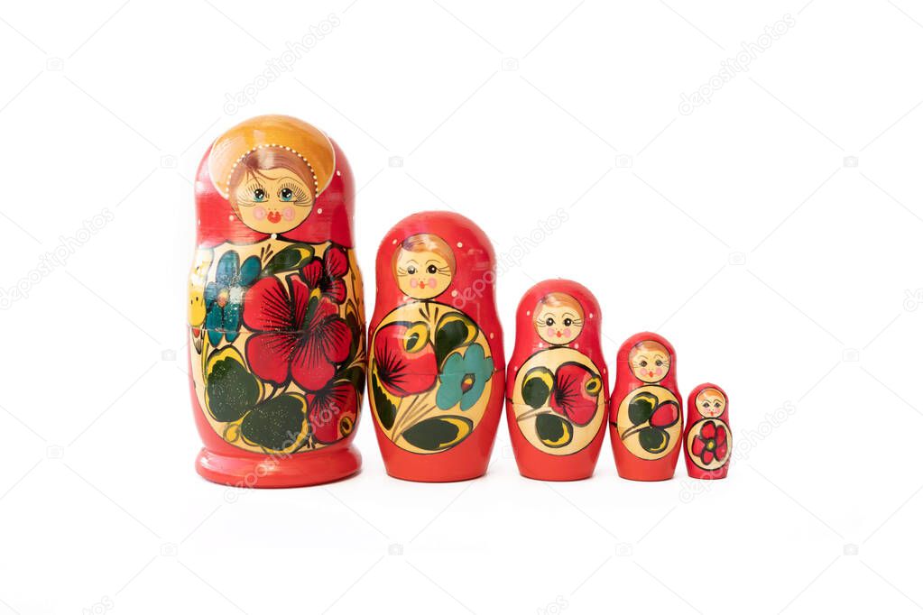 Matryoshka doll set in a row isolated. A symbol of the feminine side of Russian traditional and culture. Wooden doll toys. Crafts, painting and art.