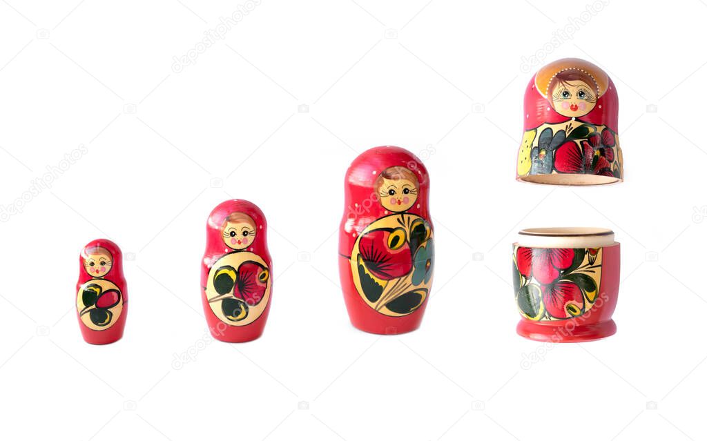Matryoshka doll set in a row isolated. A symbol of the feminine side of Russian traditional and culture. Wooden doll toys. Crafts, painting and art.