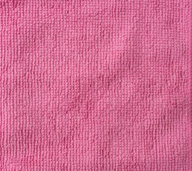 Pembe kumaş havlu desenli yüzey dokusu. Tasarım dekorasyonu için malzeme yakın plan