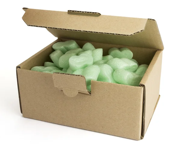 Boîte d'emballage avec mousse verte — Photo