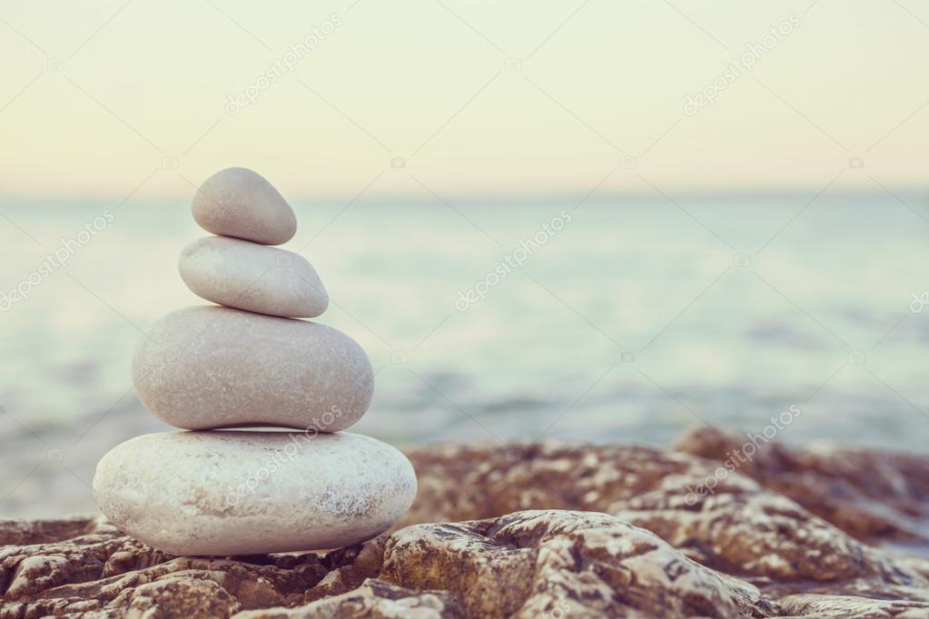 Instagram Pile Of Stones On Tranquil Beach At Sunset Stock Photo By C Dmbaker