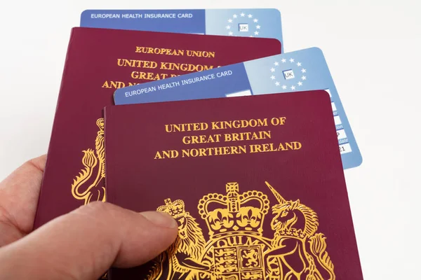Hand Holding United Kingdom British Passports Ehic European Union Health — Stock Photo, Image