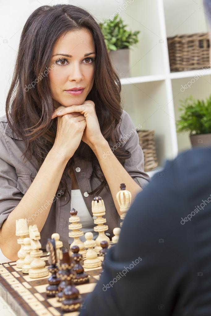 Young female concentrating hard of her next move at a chess game Stock  Photo - Alamy