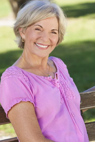 Portrait Happy Senior Woman Sitting Outside — Stock Photo, Image