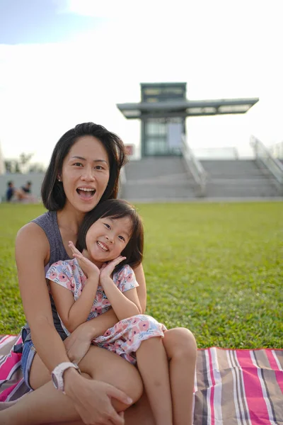 Asian Mother Daughter Enjoying Outdoors Picnic Weekend Stock Photo